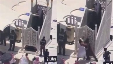 صورة قبض اربعة رجال شرطة سعوديون على شاب خرج من حمامات الحرم النبوي